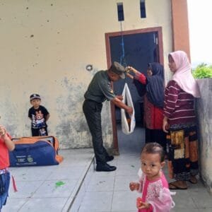 TNI Peduli Kesehatan Warga, Babinsa Koramil 1505-02/Wasile Turun Langsung di Kegiatan Posyandu