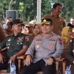 Kapolres Nganjuk Hadiri Apel Akbar KNC 2025, Ribuan Pelajar Nganjuk Terima Beasiswa