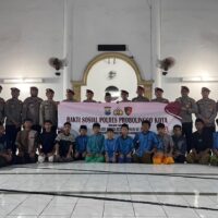 Satreskrim dan Satresnarkoba Polres Probolinggo Kota Gelar Baksos, Serahkan Puluhan Paket Sembako