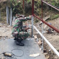 TNI AD Rampungkan Rehab Jembatan Gantung Halimbe, Akses Warga Labura Kembali Lancar