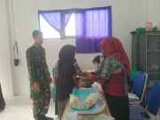 Babinsa Koramil 1002-06/Barabai Turun Langsung Dampingi Posyandu, Dorong Kesadaran Kesehatan Keluarga