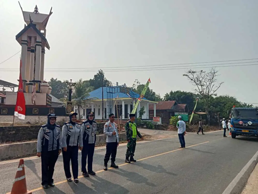 Wujud Kepedulian kepada Masyarakat, Koramil Kelua Kawal Maulid Agung Nabi Muhammad SAW